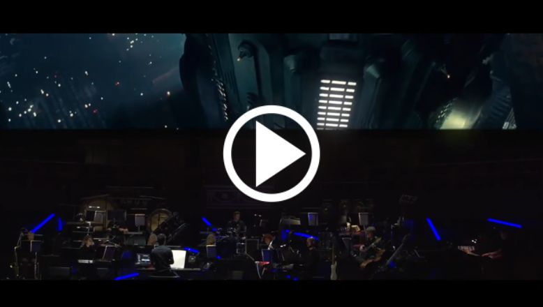 Graphic of the movie Blade Runner and an orchestra playing the score.